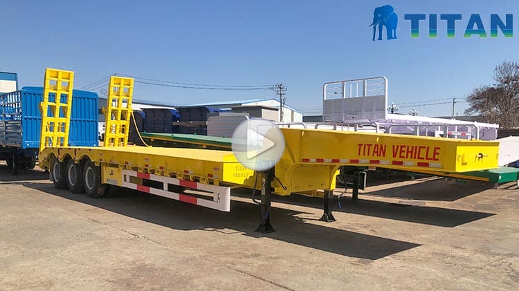 Remolque de plataforma baja de tres ejes en venta en Dominicana