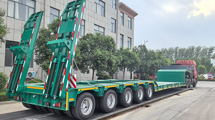 Remolque hidr&aacute;ulico de plataforma baja multieje en venta en 